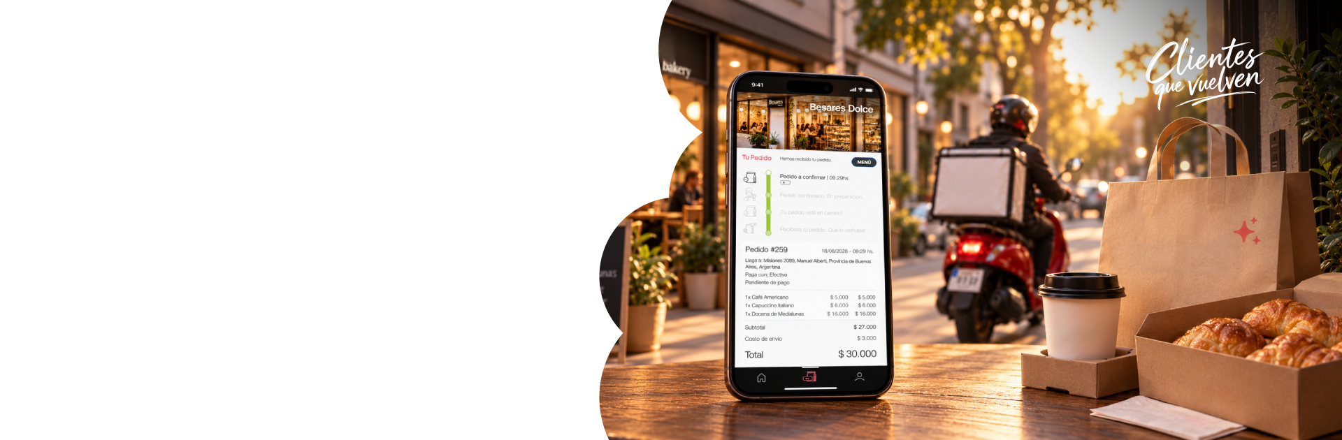 Pedido de delivery en el celular junto a café, medialunas y un repartidor en moto.